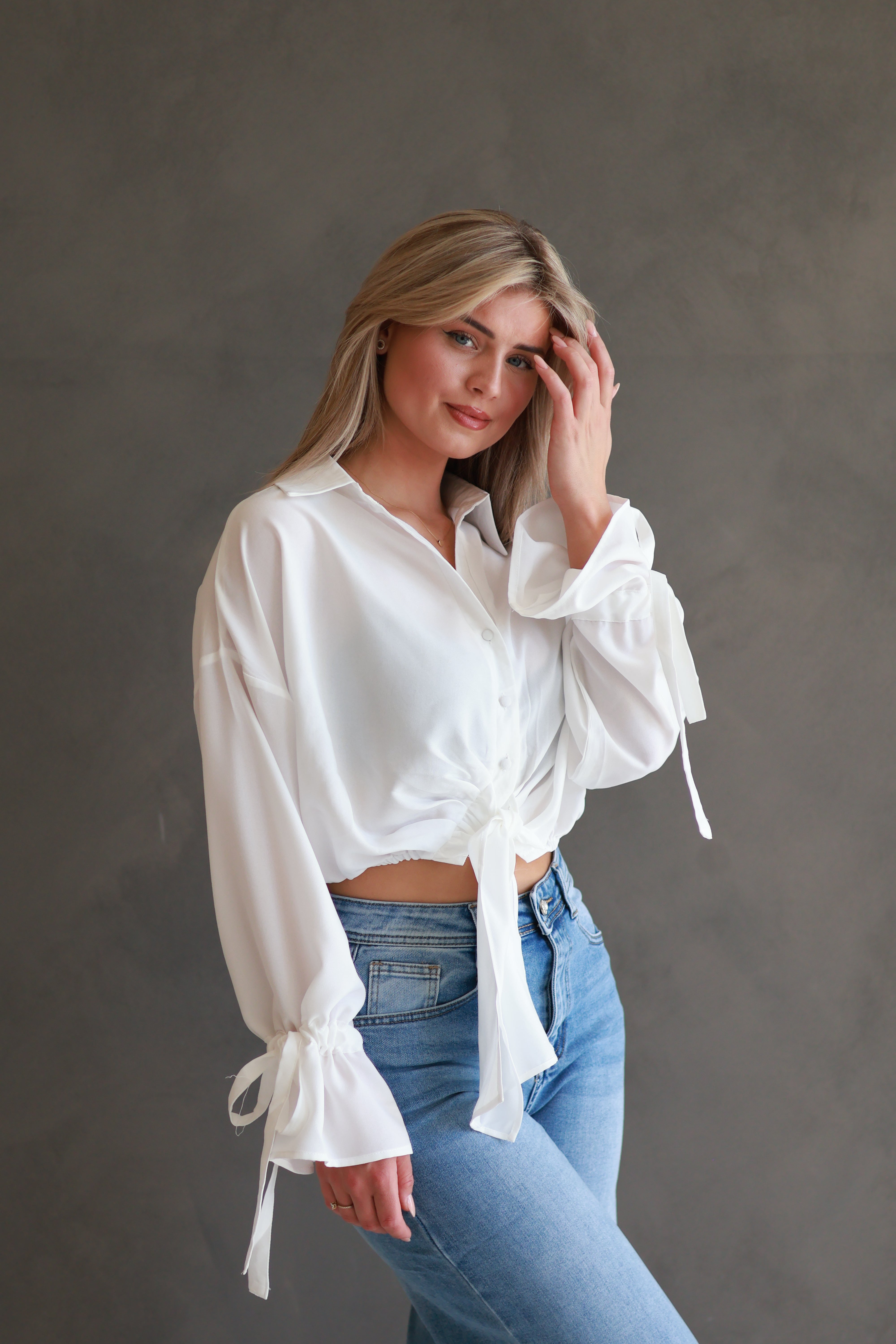 WITTE BLOUSE MET STRIKDETAIL