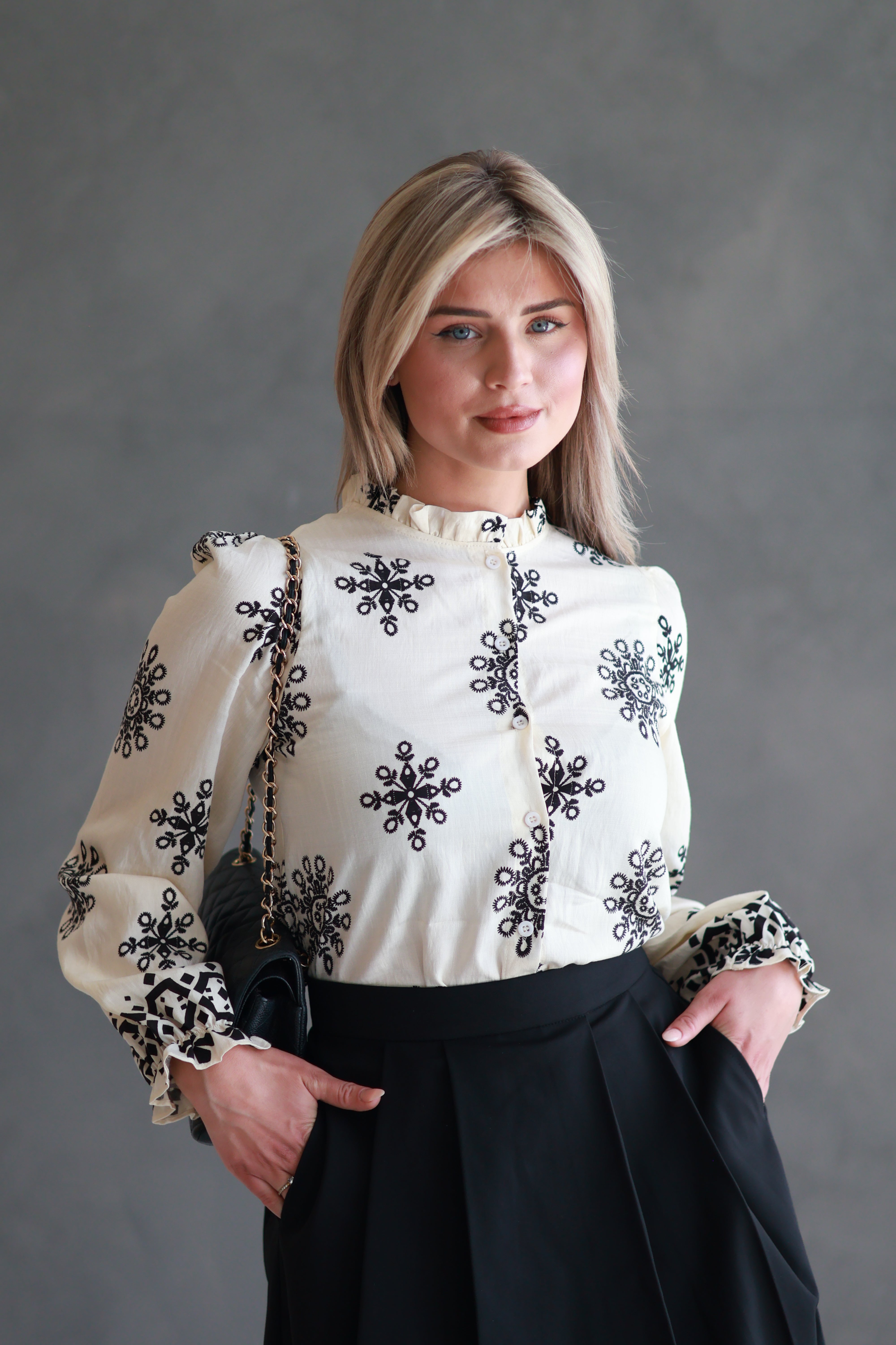 BLOUSE MET VOLANTS
